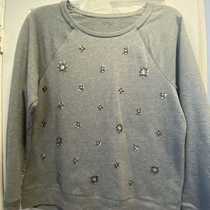 Snowflake sweater with sequin and bead detailing.